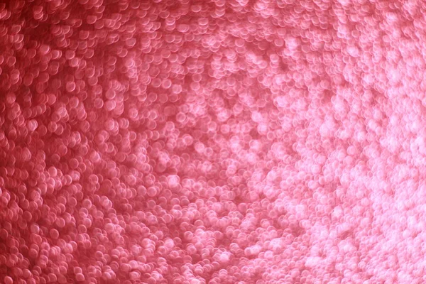 Pembe parıltılı soyut arkaplan ve Bokeh odaklı ışıklar