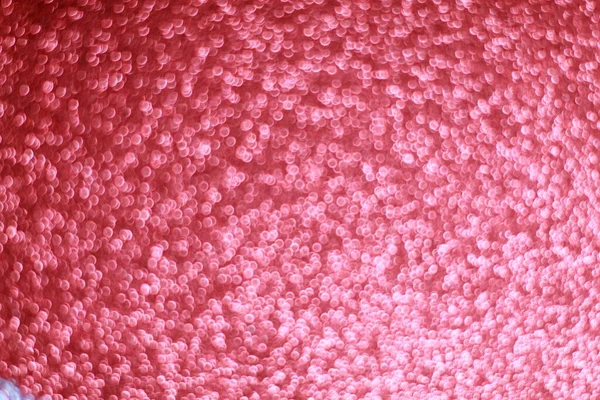 Pembe parıltılı soyut arkaplan ve Bokeh odaklı ışıklar