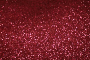 Bokeh odaklı ışıklarla kırmızı parıltılı soyut arkaplan