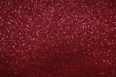 Bokeh odaklı ışıklarla kırmızı parıltılı soyut arkaplan