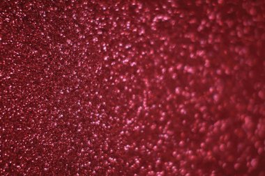 Bokeh odaklı ışıklarla kırmızı parıltılı soyut arkaplan