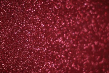 Bokeh odaklı ışıklarla kırmızı parıltılı soyut arkaplan