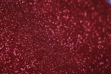 Bokeh odaklı ışıklarla kırmızı parıltılı soyut arkaplan