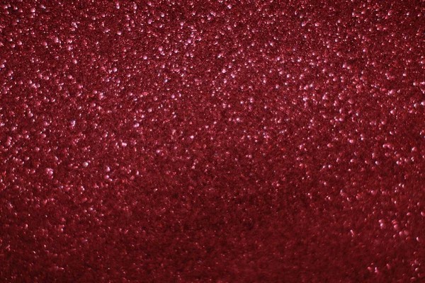 Bokeh odaklı ışıklarla kırmızı parıltılı soyut arkaplan