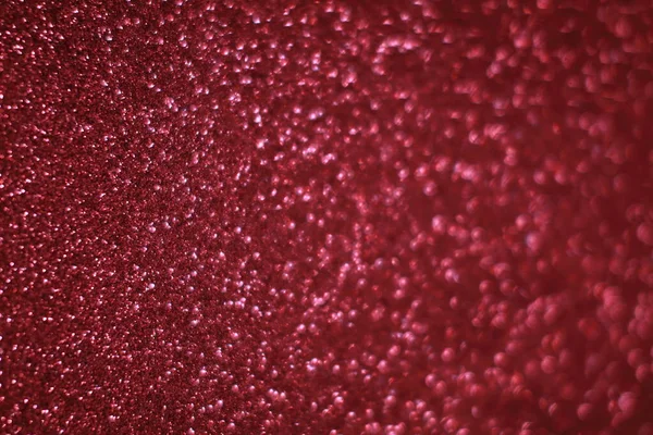 Bokeh odaklı ışıklarla kırmızı parıltılı soyut arkaplan