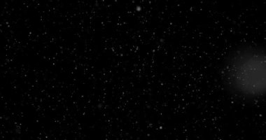 Siyah zemin üzerinde rastgele uçan küçük beyaz parçacıklara sahip video