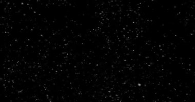 Siyah zemin üzerinde rastgele uçan küçük beyaz parçacıklara sahip video