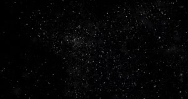 Siyah zemin üzerinde rastgele uçan küçük beyaz parçacıklara sahip video