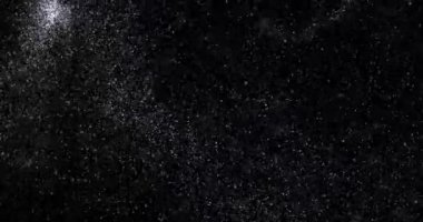 Siyah zemin üzerinde rastgele uçan küçük beyaz parçacıklara sahip video