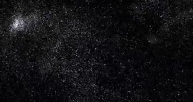 Siyah zemin üzerinde rastgele uçan küçük beyaz parçacıklara sahip video