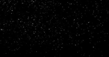 Siyah zemin üzerinde rastgele uçan küçük beyaz parçacıklara sahip video