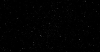 Animation with small white particles flying randomly on black background