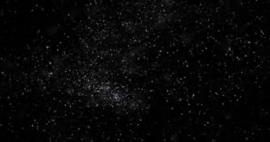 Siyah zemin üzerinde rastgele uçan küçük beyaz parçacıklara sahip video