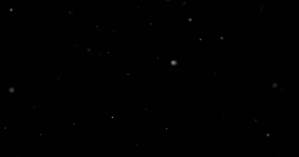 黒い背景にチリ粒子を飛ばす — ストック写真