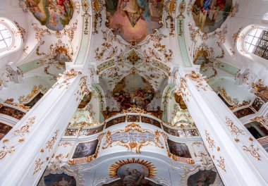 ANDECHS, BAVARIA, GERMANY, JUNE 03, 2022 : interiors, frescoes and architectural decors of  Andechs abbey church, by scultptor Johann Baptist Straub, and painter Johann Baptist Zimmermann for frescoes and stuccoworks, 18th century