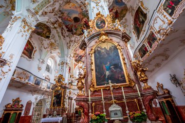 ANDECHS, BAVARIA, GERMANY, JUNE 03, 2022 : interiors, frescoes and architectural decors of  Andechs abbey church, by scultptor Johann Baptist Straub, and painter Johann Baptist Zimmermann for frescoes and stuccoworks, 18th century