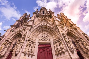 CHATEAUNEUF SUR CHER, FRANCE, APRIL 09, 2022 : exteriors and architectural details of  Our Lady of the Children basilica