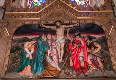 CHATEAUNEUF SUR CHER, FRANCE, APRIL 09, 2022 : station of the cross of Jesus Christ inf  Our Lady of the Children basilica