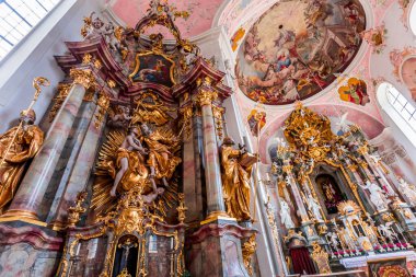 OBERAMMERGAU, BAVARIA, GERMANY, JUNE 01, 2022 : Rococo and baroque decors in Catholic Church of Oberammergau, by various anonymous artists , 18th century
