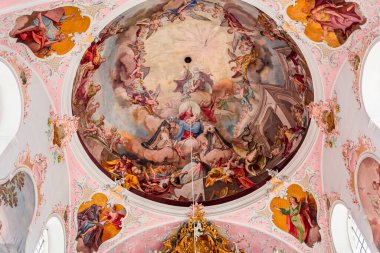 OBERAMMERGAU, BAVARIA, GERMANY, JUNE 01, 2022 : Rococo and baroque decors in Catholic Church of Oberammergau, by various anonymous artists , 18th century