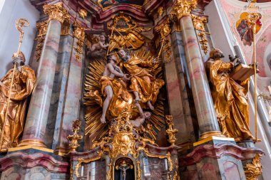 OBERAMMERGAU, BAVARIA, GERMANY, JUNE 01, 2022 : Rococo and baroque decors in Catholic Church of Oberammergau, by various anonymous artists , 18th century