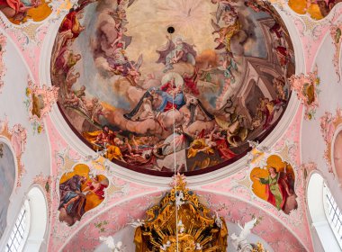 OBERAMMERGAU, BAVARIA, GERMANY, JUNE 01, 2022 : Rococo and baroque decors in Catholic Church of Oberammergau, by various anonymous artists , 18th century