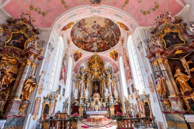 OBERAMMERGAU, BAVARIA, GERMANY, JUNE 01, 2022 : Rococo and baroque decors in Catholic Church of Oberammergau, by various anonymous artists , 18th century