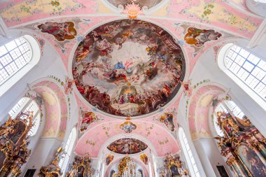 OBERAMMERGAU, BAVARIA, GERMANY, JUNE 01, 2022 : Rococo and baroque decors in Catholic Church of Oberammergau, by various anonymous artists , 18th century