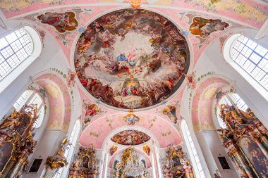 OBERAMMERGAU, BAVARIA, GERMANY, JUNE 01, 2022 : Rococo and baroque decors in Catholic Church of Oberammergau, by various anonymous artists , 18th century