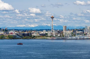 Cascade Mountain can be seen behind the Seattle skyline in Washington State.