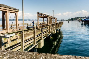 A wooden fish ing pier in Ruston near Tacoma, Washington.