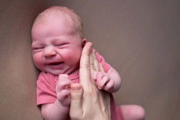 Baby boy crying while posing for his first portrait — Stock Photo, Image