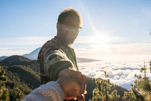Man Holding Woman Hands Looking Her Amazing Mountain Sunset Background — 图库照片