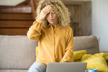 Overwork and stress bad health condition. Adult woman touching head