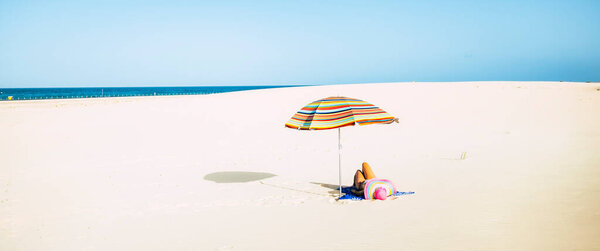 Woman Tourist Laying Sand Beach Straw Hat Colorful Umbrella Enjoying Royalty Free Stock Photos