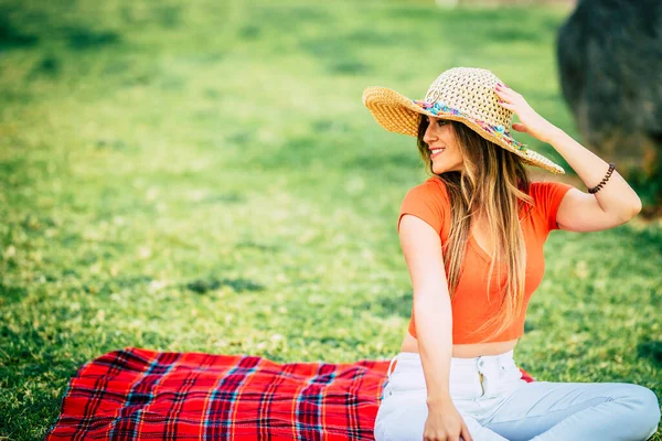 Portrait Trendy Young Female Relaxing Sitting Red Cover Meadow Field — ストック写真