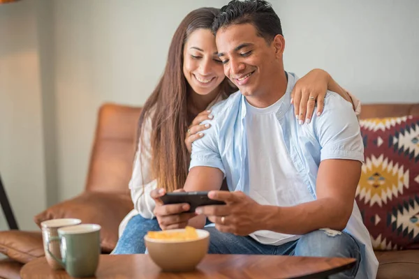 Black Boy Girl Smile Have Fun Playing Smartphone Home Sitting - Stock-foto