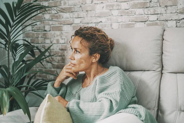 Thoughtful Worried Lady Home Sitting Sofa Looking Serious Thinking Lot — Φωτογραφία Αρχείου