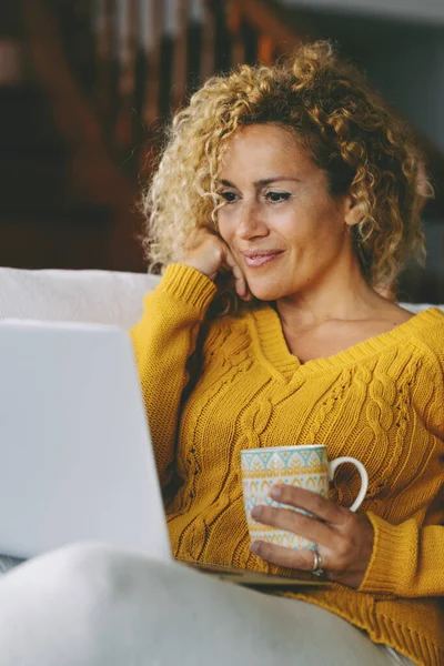 Female Sitting Yellow Couch Using Laptop Internet Connection Smile Happy — Foto Stock