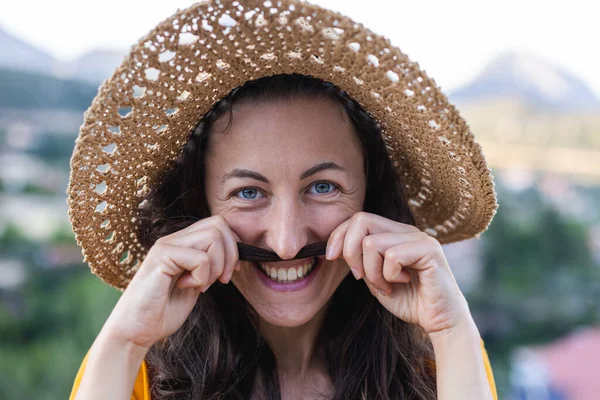 Girl Plays Her Hair Young Playful Girl Makes Mocking Mustache — Foto Stock