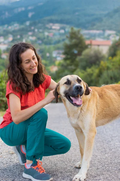 Woman Walks Dog Girl Strokes Big Kind Shepherd Dog Pet — Stockfoto
