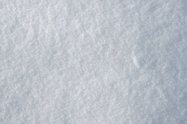 Background with a fragment of a flat snow surface