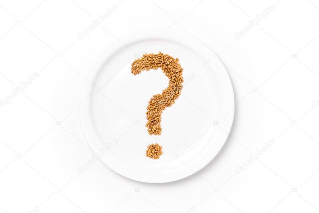 Question mark made of wheat grains on white plate. Concept of global food scarcity, famine and hunger. Food shortage and supply chain problems