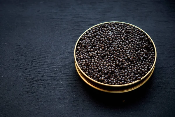 Caviar Negro Cerca Fondo Negro Aislado Imagen De Stock