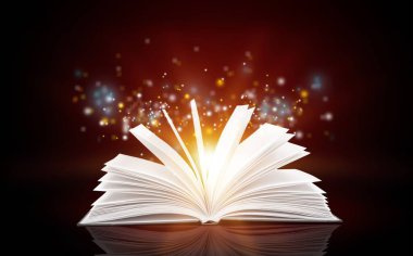 Koyu arkaplan üzerine parlayan sayfaları olan açık bir kitap