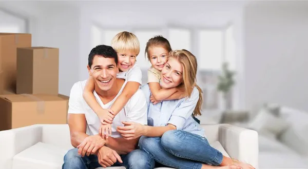 Beautiful Smiling Family Sitting Sofa Home — Stock Photo, Image