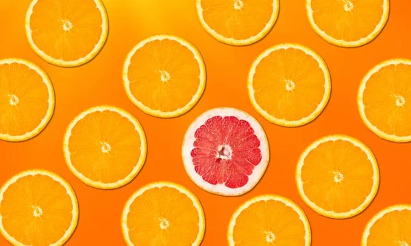 オレンジの背景にオレンジの果実 — ストック写真