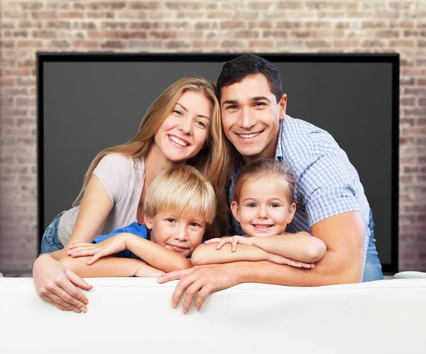 Young Family Home Smiling Camera — Stock Photo, Image