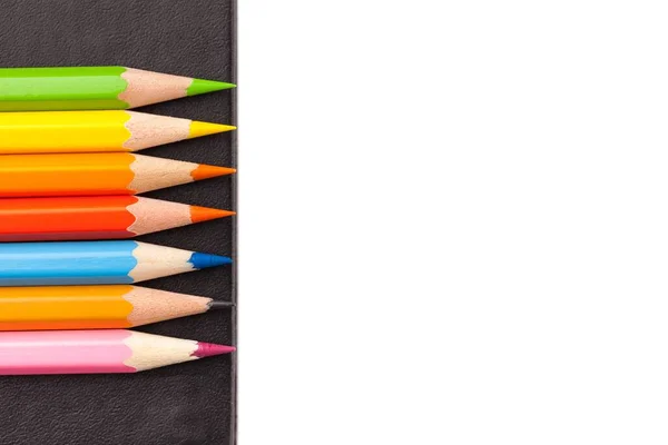 Kolorowe Ołówki Notatniku Fotografia — Zdjęcie stockowe