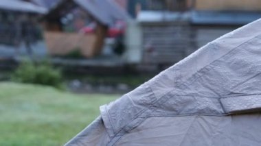 Morning Dew and Drops on the Awning of the Tent in Nature